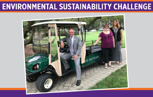 President Pietruszkiewicz sitting in UE Recycles golf cart