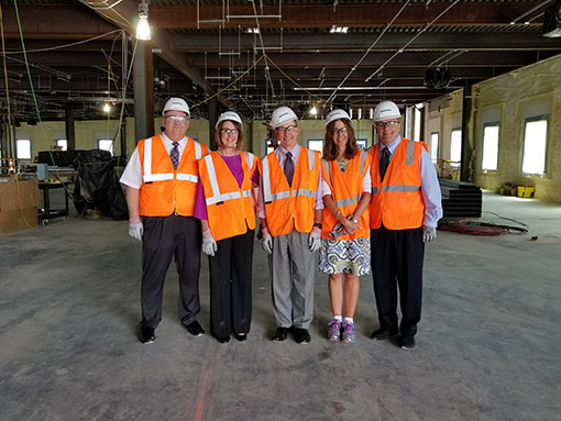 Dr. Kazee and others at construction site