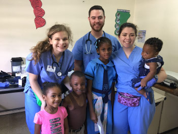 UE Nursing students with patients in Jamaica