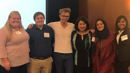 Group photo of Harness, Turner, Blyth-Clarke, Jeong, Shamim, and Abraham at conference.