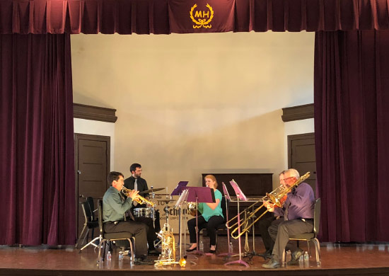 UE Shepard Brass performing on stage