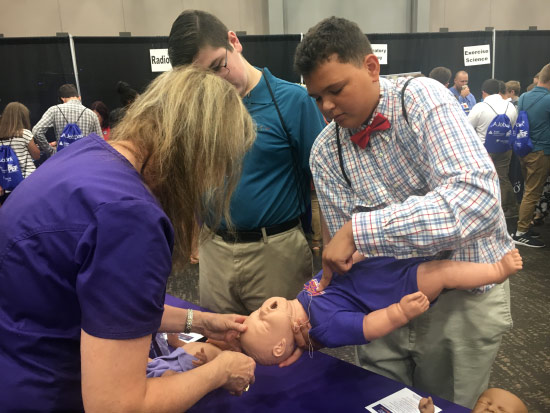 JobSpark attendees learning child CPR