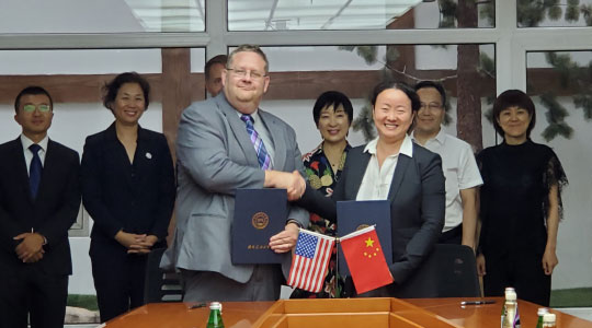 Austin meeting with officials from Chinese universities