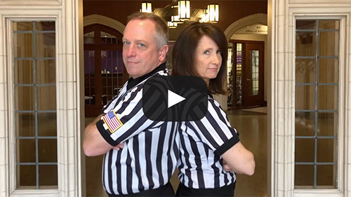 President and wife in referee uniforms.